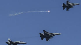 Pakistan's Air Force fighter JF-17 fighter jets fly past during the multinational naval exercise 'AMAN-23' in the Arabian Sea near Pakistan's port city of Karachi on February 13, 2023.