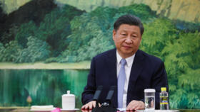 China's President Xi Jinping attends a meeting at the Great Hall of the People in Beijing on June 19, 2023.