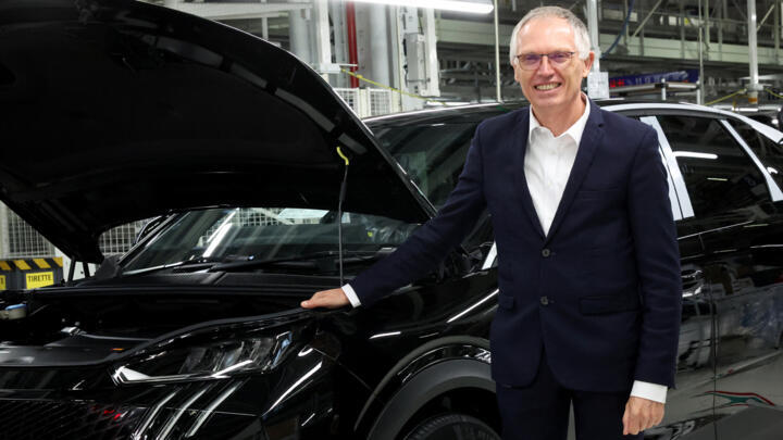 Carlos Tavares poses at a Peugeot factory in Sochaux, eastern France, on October 3, 2024.