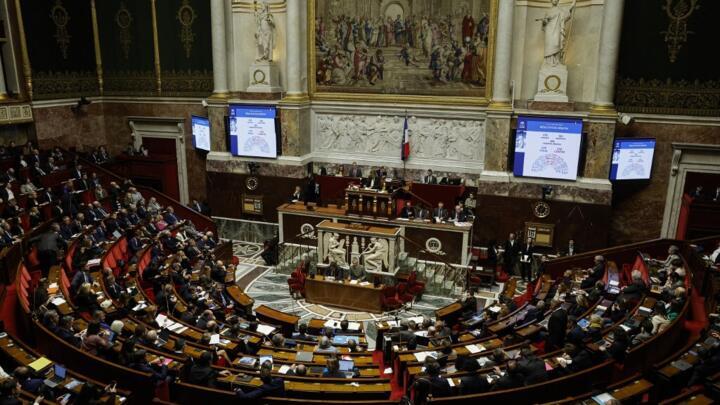 French MPs attend a session to vote on the special budget draft law at the National Assembly in Paris on December 16, 2024.