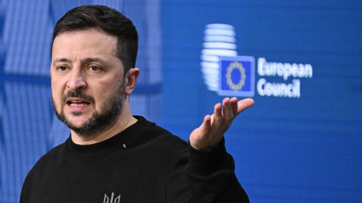 Ukraine's President Volodymyr Zelensky gestures as he speaks during a press conference after the European Council meeting at the EU headquarters in Brussels on December 19, 2024.
