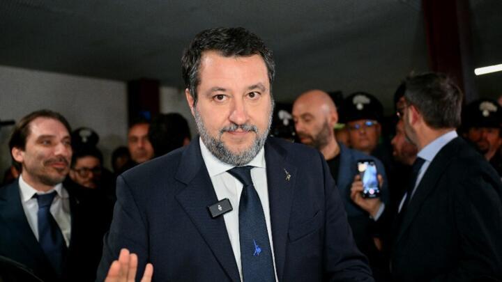 Italy's Deputy Prime Minister Matteo Salvini waves at the Bunker Courtroom of the Pagliarelli prison in Palermo, Sicily, on December 20, 2024.