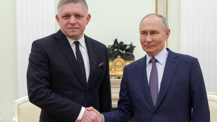 Russia's President Vladimir Putin shakes hands with Slovakia's Prime Minister Robert Fico prior to their talks in Moscow on December 22, 2024.