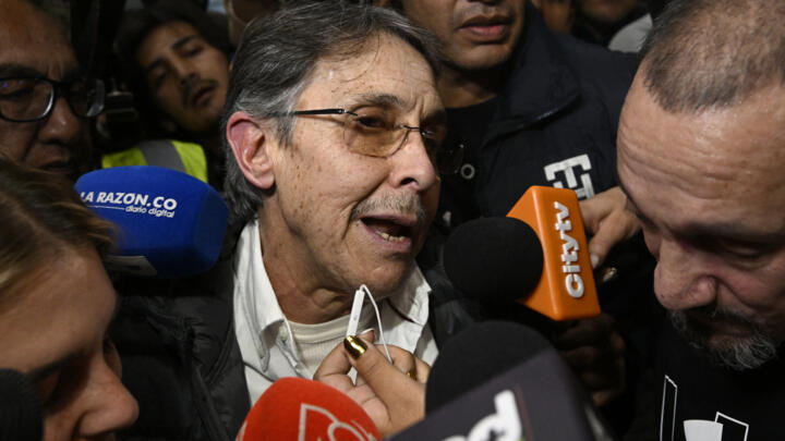 Fabio Ochoa, a former Medellin Cartel kingpin, talks to the media at El Dorado International Airport after being deported from the US, in Bogota on December 23, 2024.