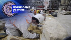 Archaeologists excavate the floor of Notre Dame Cathedral after the discovery of a 15th-century lead sarcophagus, March 15 2022.