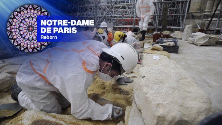 Archaeologists excavate the floor of Notre Dame Cathedral after the discovery of a 15th-century lead sarcophagus, March 15 2022.