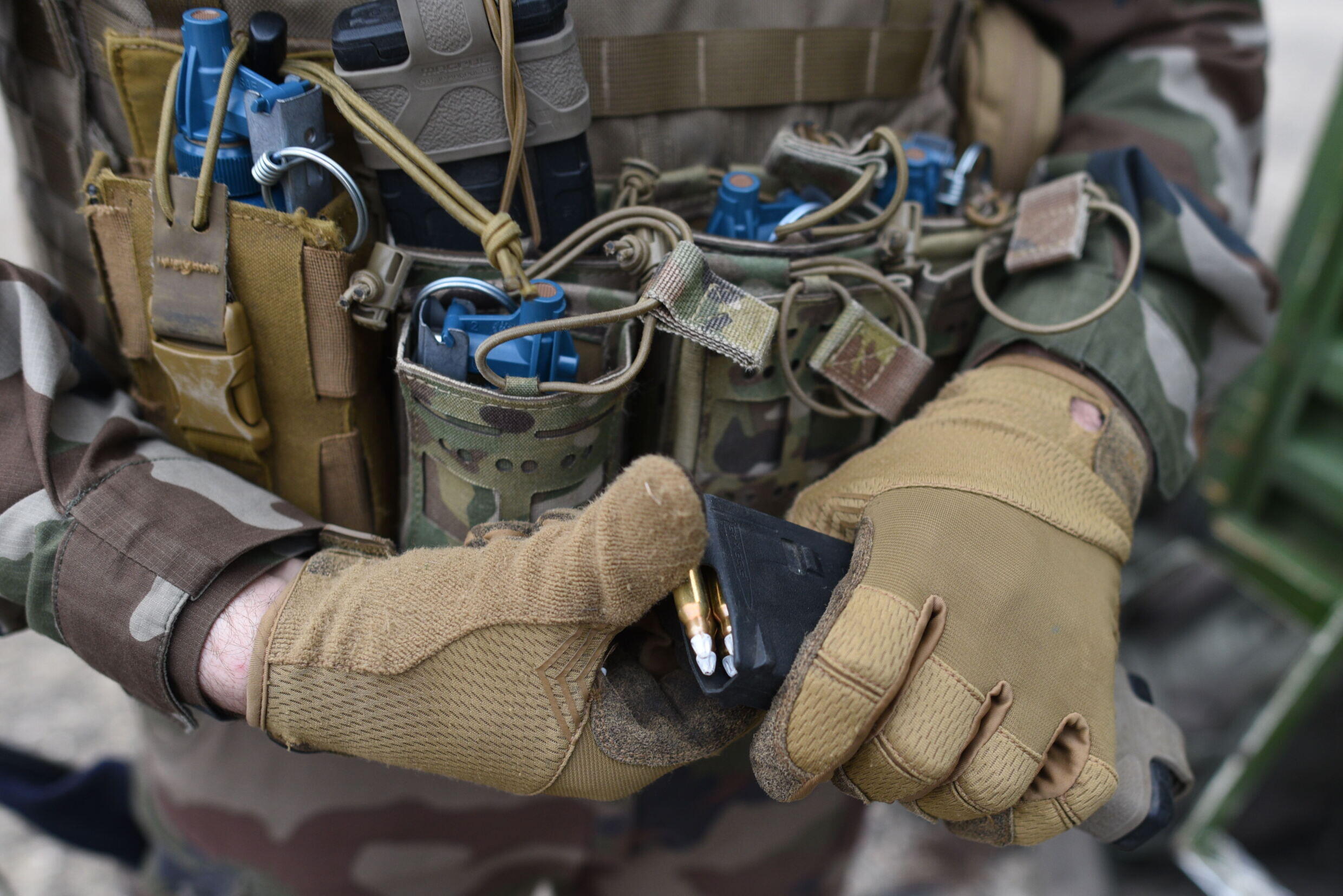 Close-up of the blank ammunition and training grenades used during an exercise in the trenches of the camp of the Régiment de Marche du Tchad on 17 December 2024.