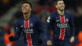 PSG's French midfielder Desiré Doué celebrates scoring his team's third goal during the UEFA Champions League football match in Salzburg, Austria on December 10, 2024.