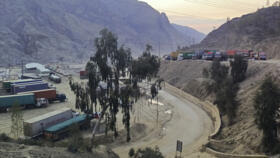 Truck wait in Pakistan's Khyber district to cross the border into Afghanistan on February 21, 2023.
