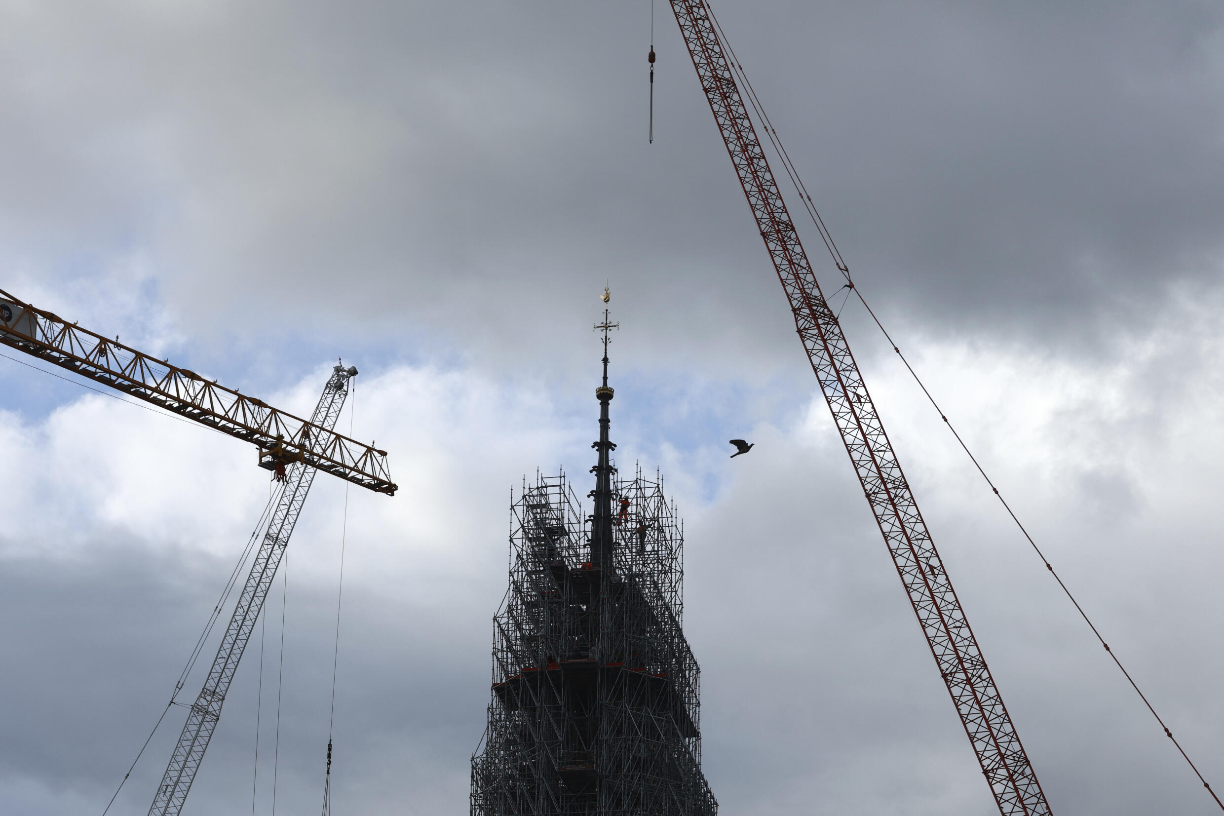 Scaffolding is removed around the spire of Notre-Dame on February 12, 2024.