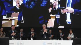Mukhtar Babayev, COP29 President, centre, applauds during a closing plenary session at the COP29 UN Climate Summit, Sunday, Nov. 24, 2024, in Baku, Azerbaijan.