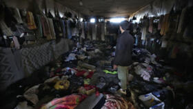 A man looks at a room of the infamous Saydnaya military prison, just north of Damascus, Syria, on Monday, December 9, 2024.