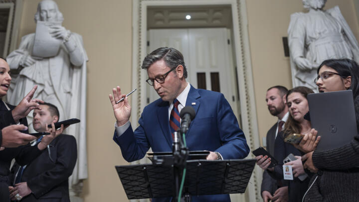 US Speaker of the House Mike Johnson, R-La., talks briefly to reporters just before a vote on an interim spending bill to prevent a government shutdown in Washington, DC, Thursday, December 19, 2024.