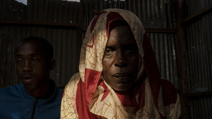 Zaharia Youssouf, who lost her husband during Cyclone Chido, awaits aid in Barakani, Mayotte on December 21, 2024.