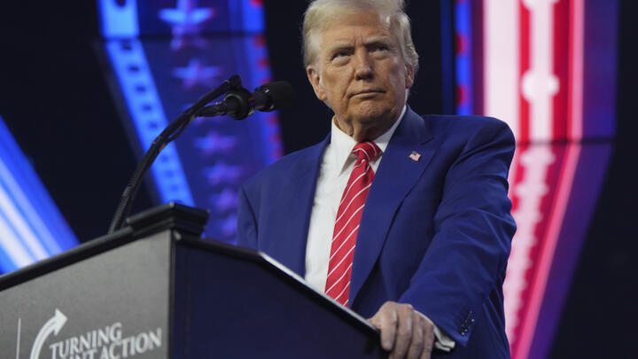 President-elect Donald Trump speaks at AmericaFest, Sunday, Dec. 22, 2024, in Phoenix.