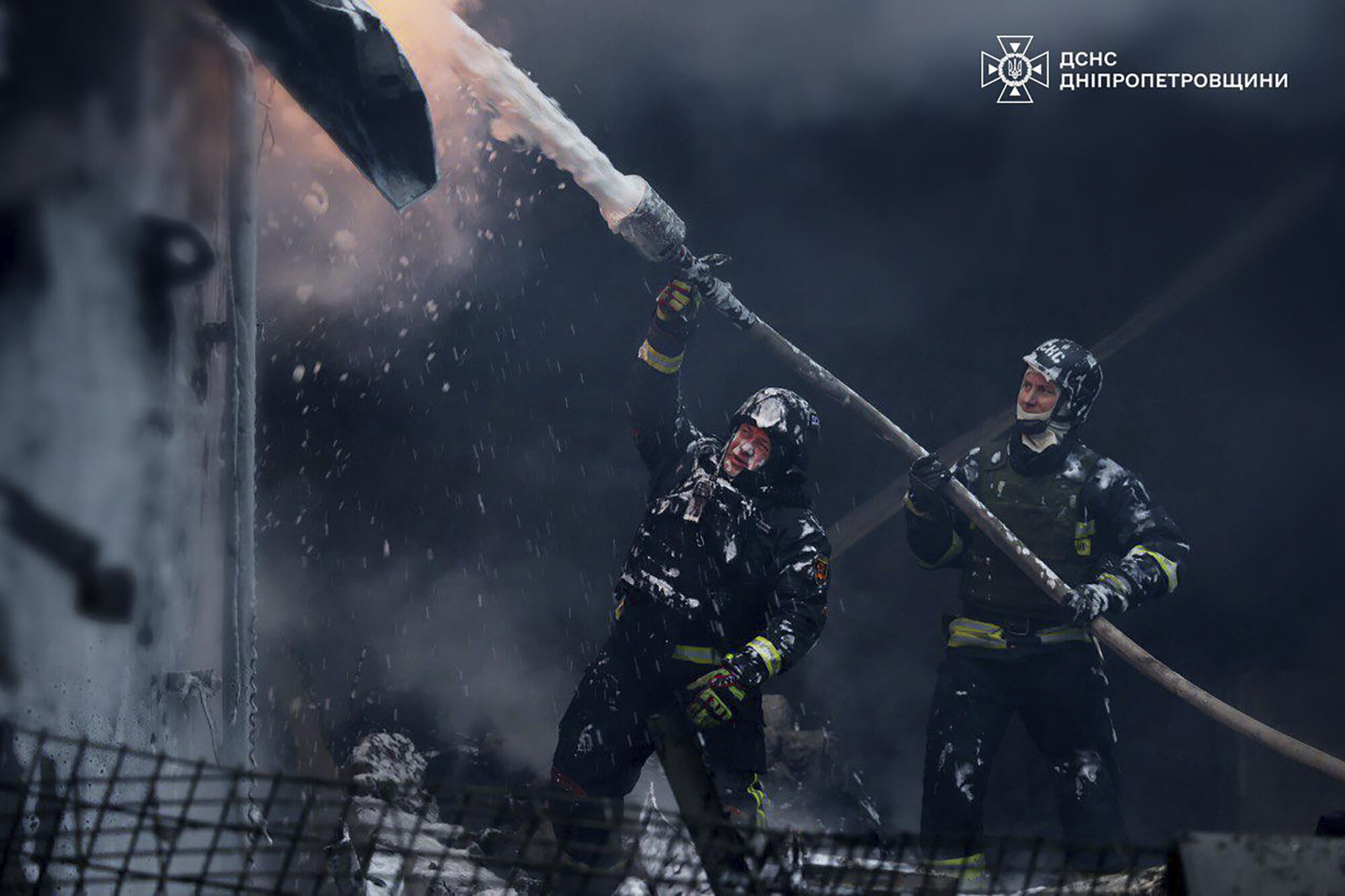 Firefighters put out a fire following a Russian missile attack in Dnipropetrovsk region on December 25, 2024.