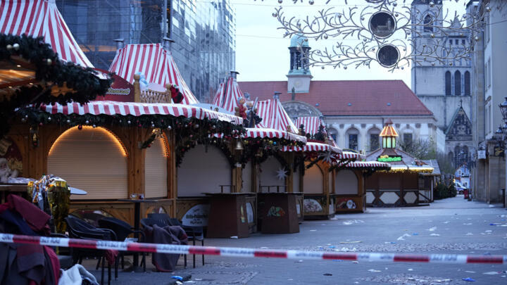 Police tape surrounds a Christmas Market in Magdeburg, Germany, where a car drove into a crowd on December 20, 2024, killing at least two.