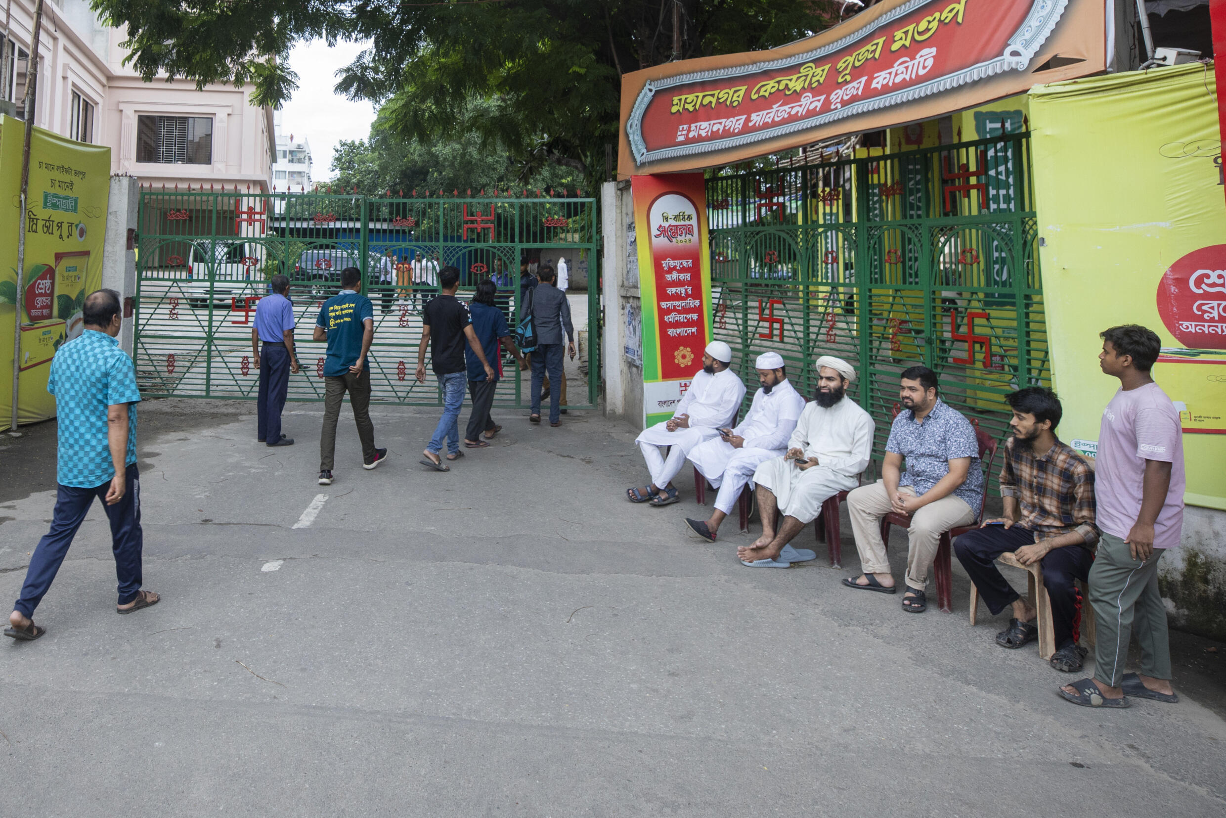 Muslim volunteers guard the Dhakeshwari temple in Dhaka, Bangladesh, August11, 2024.