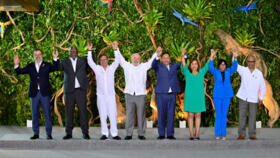 Ecuador's Foreign Minister Gustavo Manrique, Guyana's Prime Minister Mark Phillips, Colombia's President Gustavo Petro, Brazil's President Luiz Inacio Lula da Silva, Bolivia's President Luis Arce, Peru's President Dina Boluarte, Venezuela's Vice President Delcy Rodriguez and Suriname's Foreign Minister Albert Ramdin pose for a family photo at the summit of the Amazon Cooperation Treaty Organization (ACTO), in Belem, Brazil August 8, 2023.  