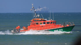 An SNSM lifeboat enters the port of Calais following a rescue operation after a migrant boat trying to cross the Channel from France capsized, in Calais, France, August 12, 2023. 