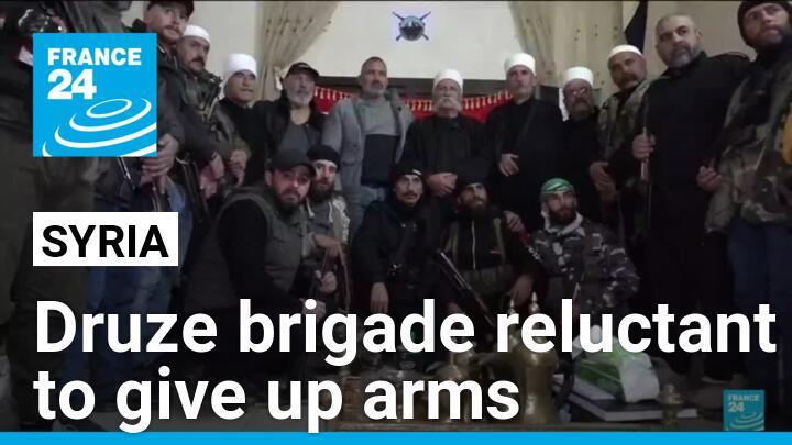 Syrian Druze brigade reluctant to give up arms in uncertain times