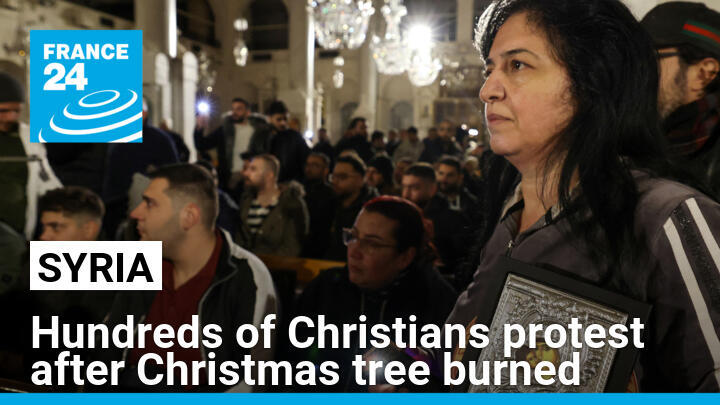 Christian worshippers stage a demonstration in the Mariamite Church in Damascus early on December 24, 2024.